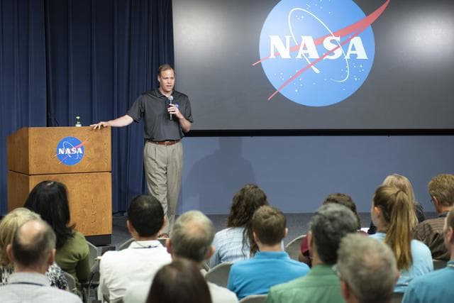 Bridenstine holds town hall with employees speaking of his vision for the agency and answering questions. 