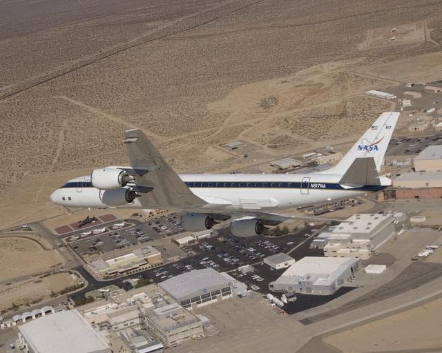 NASA image: NASA's DC-8 airborne science laboratory soars over the Dryden Flight Research Center upon its return to the center on Nov. 8, 2007