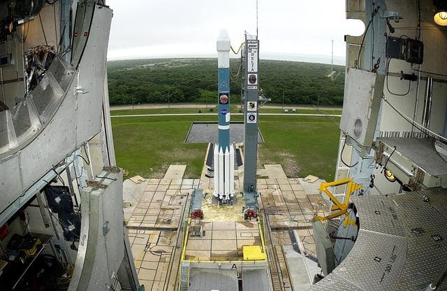 NASA image: KENNEDY SPACE CENTER, FLA. -  On Launch Complex 17-A, Cape Canaveral Air Force Station, the Boeing Delta II rocket and its Mars Exploration Rover (MER-A) payload are free of the tower  and ready for launch.  This will be the third launch attempt in as many days after weather concerns postponed the launches June 8 and June 9.  MER-A is the first of two rovers being launched to Mars.  When the two rovers arrive at Mars in 2004, they will bounce to airbag-cushioned landings at sites offering a balance of favorable conditions for safe landings and interesting science. The rovers see sharper images, can explore farther and examine rocks better than anything that has ever landed on Mars.  The designated site for MER-A mission is Gusev Crater, which appears to have been a crater lake.  The second rover, MER-B, is scheduled to launch June 25.