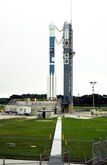 NASA image: KENNEDY SPACE CENTER, FLA. -  On Launch Complex 17-A, Cape Canaveral Air Force Station, the Boeing Delta II rocket and its Mars Exploration Rover (MER-A) payload are free of the tower  and ready for launch.  This will be the third launch attempt in as many days after weather concerns postponed the launches June 8 and June 9.  MER-A is the first of two rovers being launched to Mars.  When the two rovers arrive at the red planet in 2004, they will bounce to airbag-cushioned landings at sites offering a balance of favorable conditions for safe landings and interesting science. The rovers see sharper images, can explore farther and examine rocks better than anything that has ever landed on Mars.  The designated site for MER-A mission is Gusev Crater, which appears to have been a crater lake.  The second rover, MER-B, is scheduled to launch June 25.