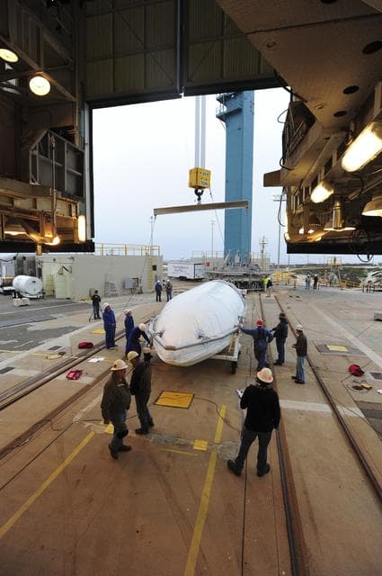 NASA image: OCO-2 Fairings being hoisted into MST