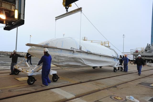 NASA image: OCO-2 Fairings being hoisted into MST