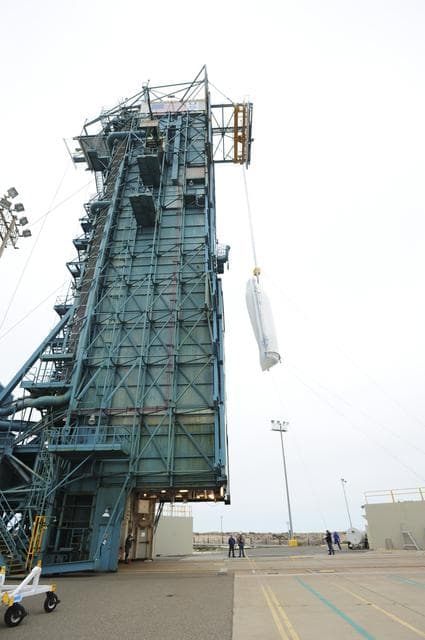 NASA image: OCO-2 Fairings being hoisted into MST