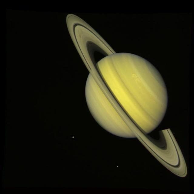 Saturn With Rhea and Dione True Color