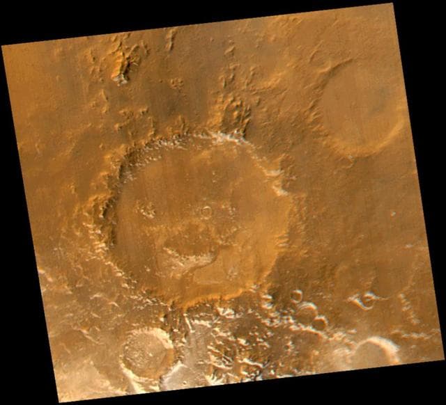 NASA image: Have a Nice Spring! MOC Revisits "Happy Face" Crater