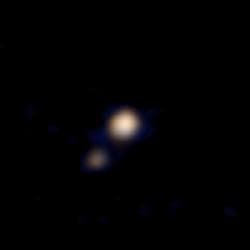NASA image: First Pluto-Charon Color Image from New Horizons