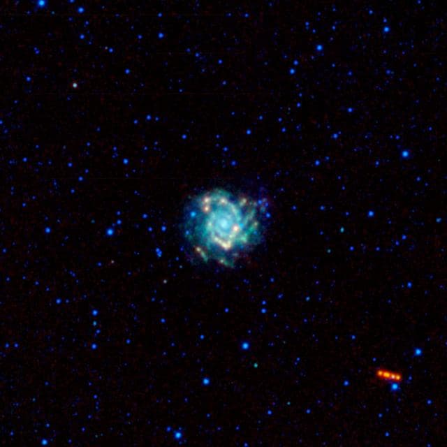 NASA image: A Spiral Galaxy is Visited by a Trojan War Hero