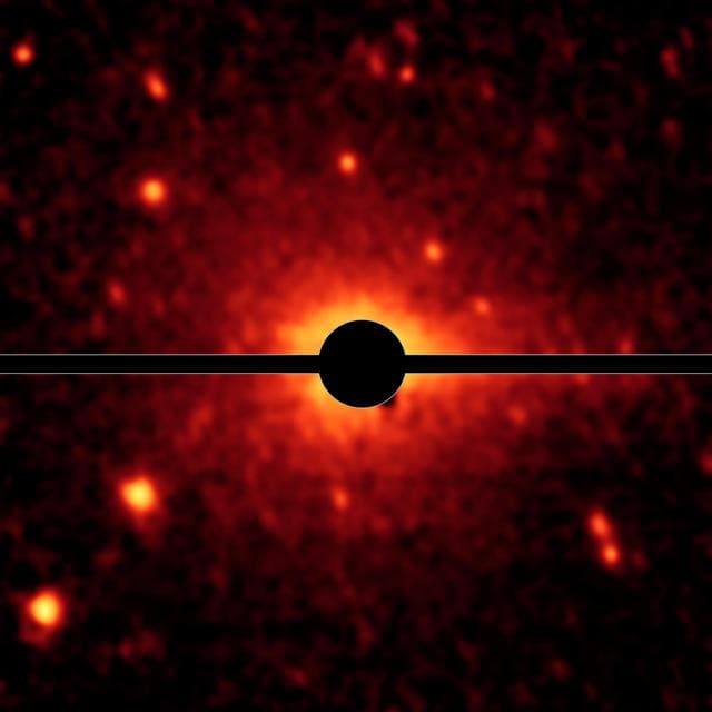 Spitzer Spies a Comet Coma and Tail