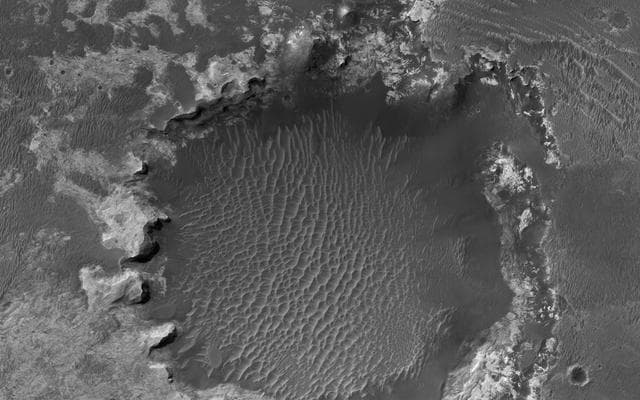 NASA image: A Crater Straddling Two Terrain Units