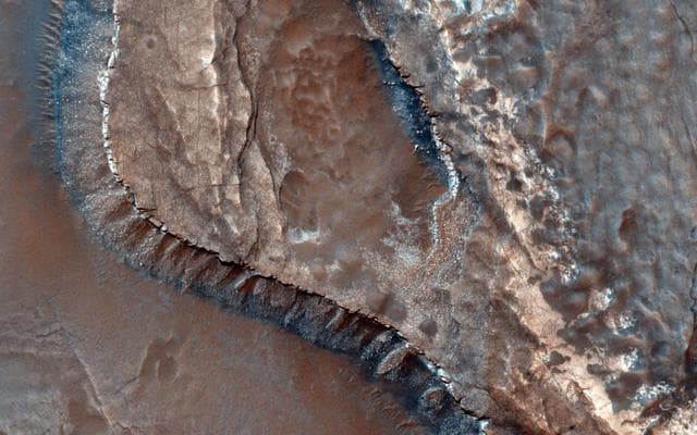 NASA image: A Channel System and Patterned Ground near Hellas Basin