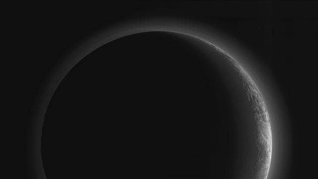 NASA image: A Full View of Pluto Stunning Crescent