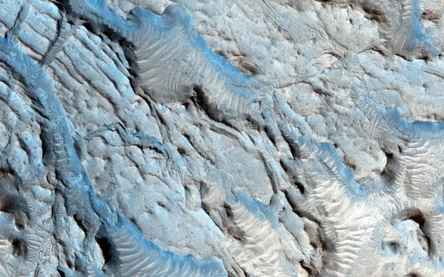 NASA image: Small Channels and a Rocky Patch in the Cydonia Region
