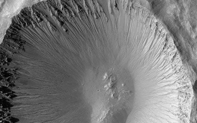 NASA image: A Youthful Crater in the Cydonia Colles Region
