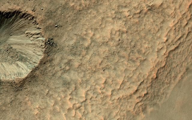 NASA image: A Crater on a Crater Wall