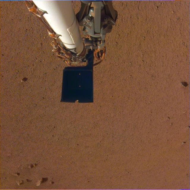 NASA image: Insight's Robotic Arm Over Martian Soil