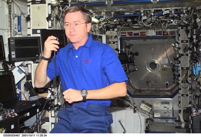 NASA image: Culbertson talks into a microphone in the U.S. Laboratory during Expedition Three