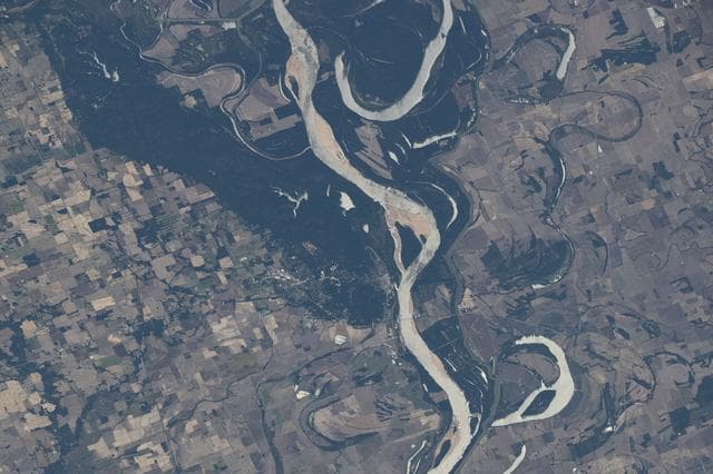 NASA image: The Mississippi River separates Arkansas from Mississippi