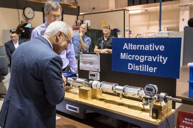 NASA image: NASA Chief Technologist Inspects a Mock-Up of Hardware at Jacobs' Engineering Development Facility