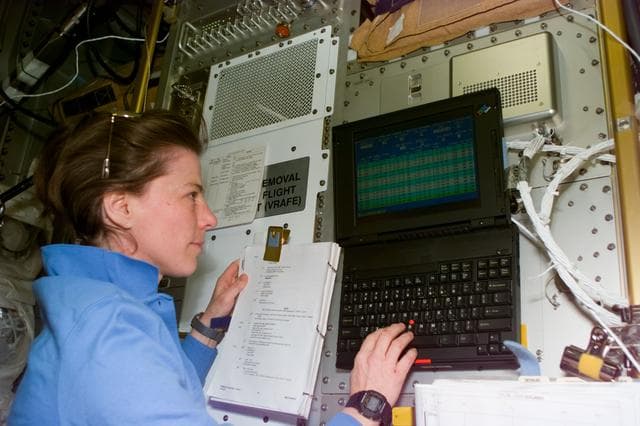 NASA image: VOA - MS Dunbar supervises experiments on Spacehab