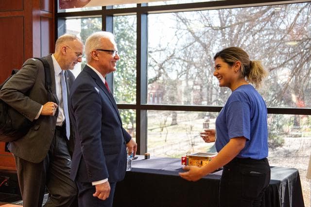 NASA image: NASA's Douglas Terrier and David Steitz Talk with a Student at NASA Day in Arkansas